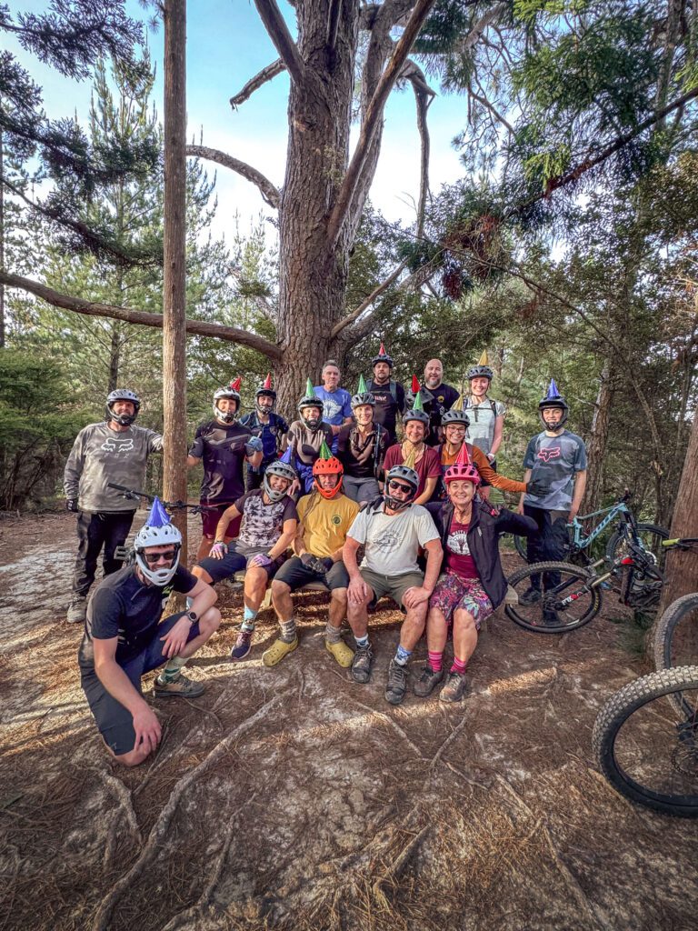yclist riding forest trails at Waitangi Mountain Bike Park.